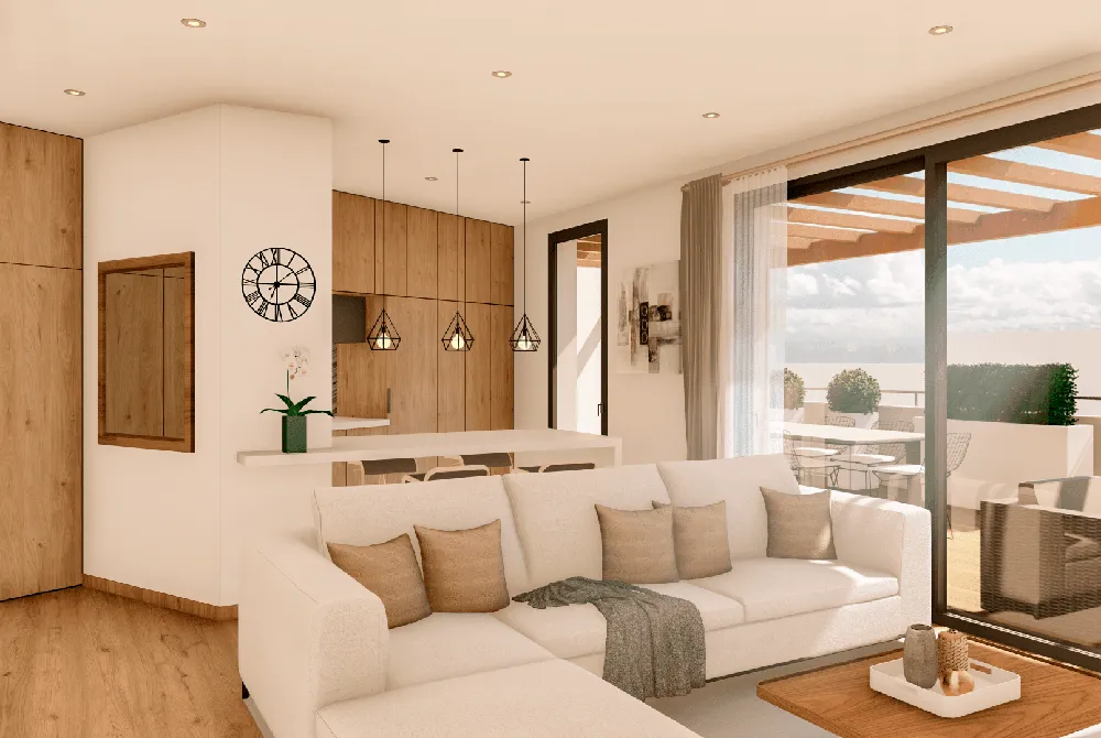 Interior de una vivienda del edificio Baladre, salón con ventanal y terraza