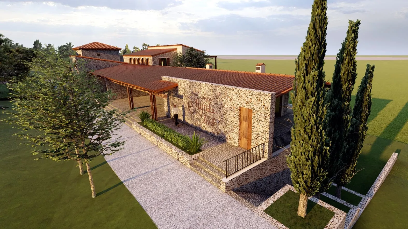 Vista aérea del edificio de piedra con cipreses, proyecto Saljub